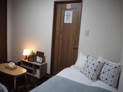 Cama o camas de una habitación en KYOTO SHIMA