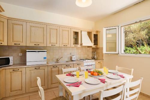 Kuchyň nebo kuchyňský kout v ubytování Seven Springs Villas