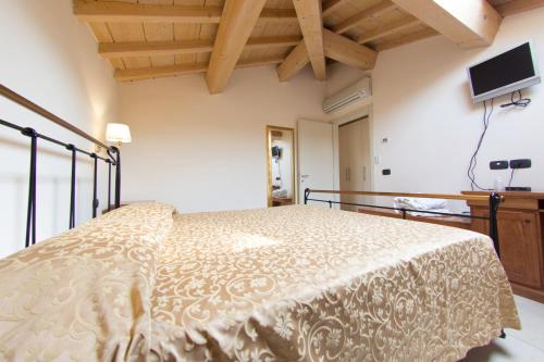 Un pat sau paturi într-o cameră la Hotel Ristorante Brusco