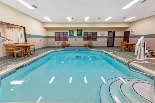a large swimming pool in a hotel room at La Quinta by Wyndham South Bend in South Bend