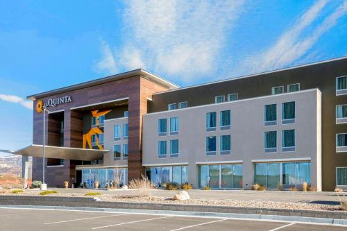 a rendering of a hotel with a building at La Quinta by Wyndham Cedar City in Cedar City