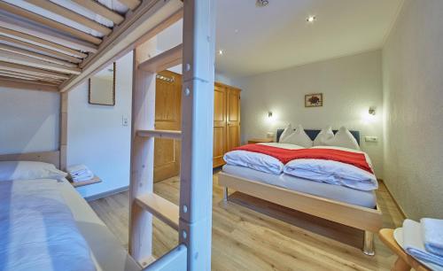 Posteľ alebo postele v izbe v ubytovaní Appartement zum Turm Top 4