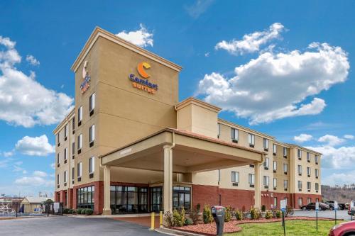 a front view of a hotel with a sign on it at Comfort Suites Pelham Hoover I-65 in Pelham