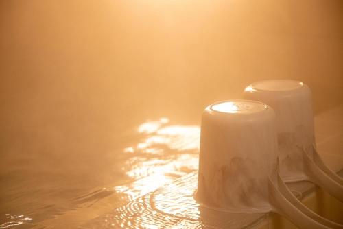 two rolls of toilet paper sitting on a table at 金剛寺 宿坊 成穂院 in Matsukawa