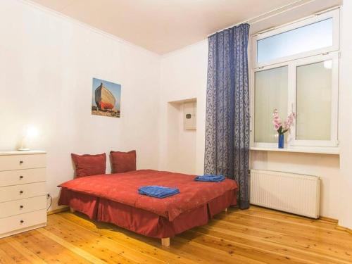 Giường trong phòng chung tại Riga Old City - 4 Bedroom Apartment
