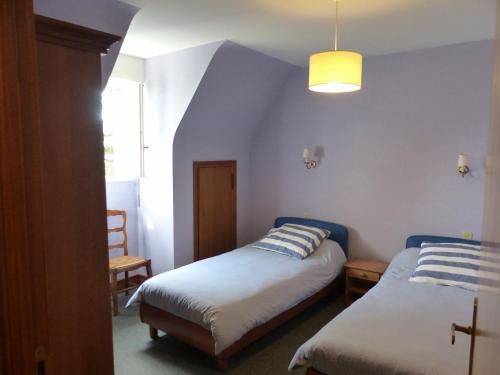 En eller flere senge i et værelse på Chal Ha Dichal, villa à Carnac