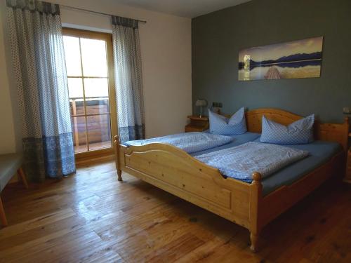 Кровать или кровати в номере Villa im Wald