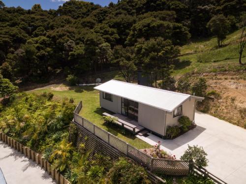 a small house on the side of a hill at Russell Top 10 Holiday Villas in Russell