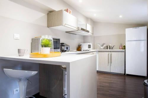 L'Esquirol - Duplex design en hypercentreにあるキッチンまたは簡易キッチン