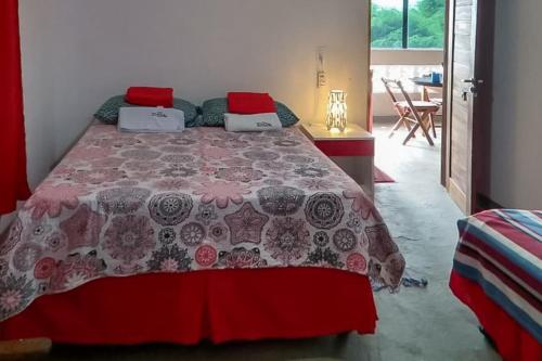 Un pat sau paturi într-o cameră la Recanto Maristela