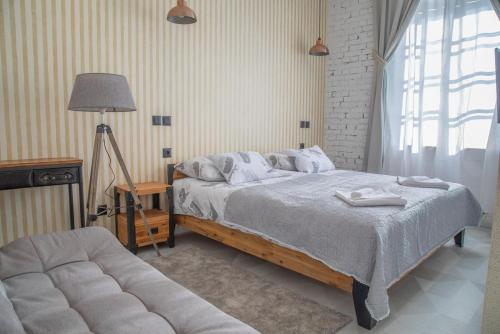 Postel nebo postele na pokoji v ubytování Domestic House Lola