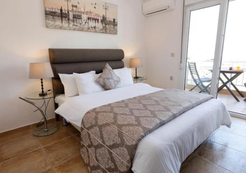 Ένα ή περισσότερα κρεβάτια σε δωμάτιο στο Apartments Bellevue
