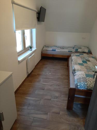 Postel nebo postele na pokoji v ubytování U Matěje