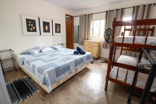 Llit o llits en una habitació de A Casa Morro do Moreno
