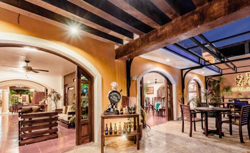 Un lugar para sentarse en El Zaguán Colonial by GuruHotel