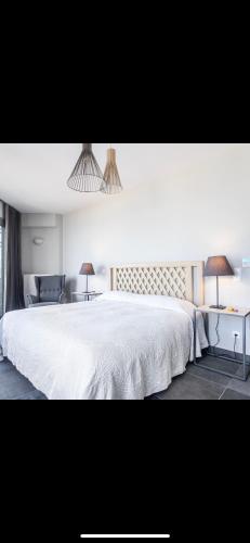 Кровать или кровати в номере Villa Aegina