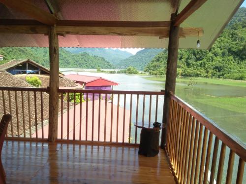 a view of a river from the balcony of a house at Tran Xuan Homestay Ba Be Village in Ba Be