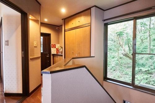 Η κουζίνα ή μικρή κουζίνα στο Chalet Itomic L - Lake view -