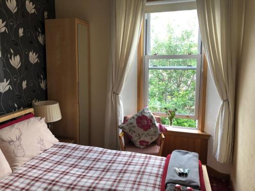 Letto o letti in una camera di Castle Walk Bed & Breakfast