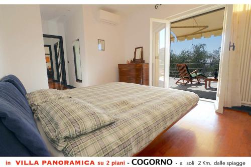 Ένα ή περισσότερα κρεβάτια σε δωμάτιο στο Villa tra gli ulivi - bellissima vista panoramica