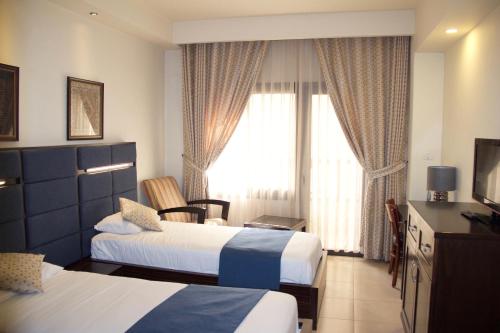Cama o camas de una habitación en National Hotel - Jerusalem