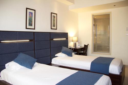Cama o camas de una habitación en National Hotel - Jerusalem