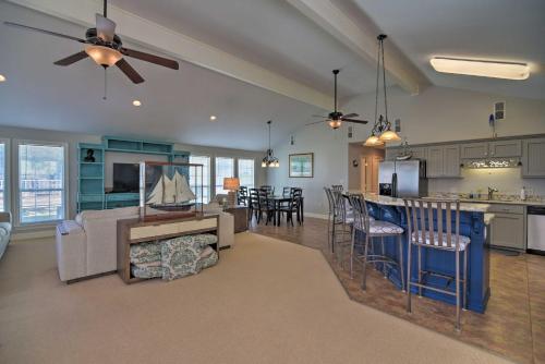 a living room with a kitchen and a dining room at Fish at Canalfront Bay St Louis Home - Dock and Deck in Shoreline Park
