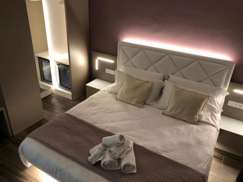 Postel nebo postele na pokoji v ubytování B&B Alma Garda Lake