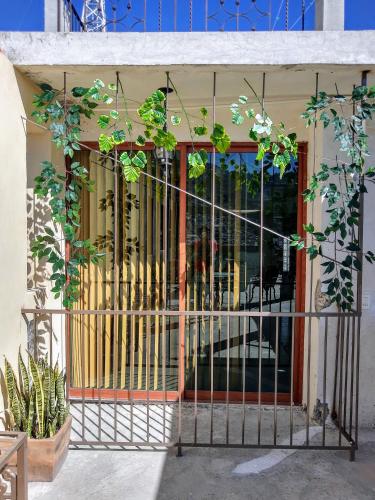 a wrought iron gate in front of a building at Hotel Posada Spa Antigua Casa Hogar in Taxco de Alarcón