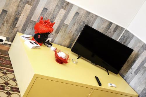 TV a/nebo společenská místnost v ubytování I Colori della SICILIA