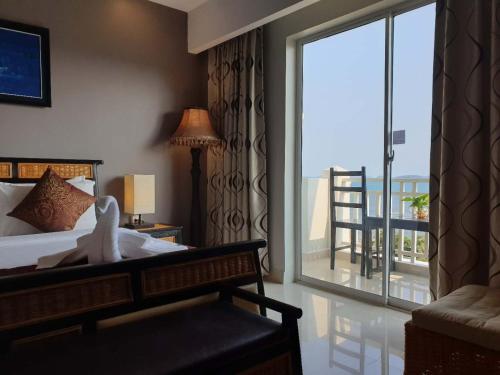 Katil atau katil-katil dalam bilik di Aristocrat Residence & Hotel