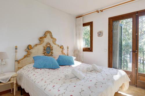 Postel nebo postele na pokoji v ubytování Villa La Torreta