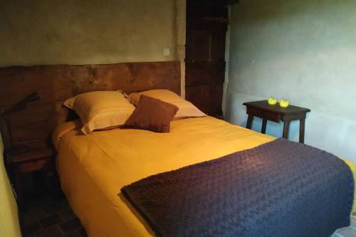 Ένα ή περισσότερα κρεβάτια σε δωμάτιο στο Gîte de charme 4 étoiles - Campagne