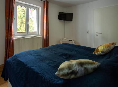 Una cama o camas en una habitación de Benjamins Refugium