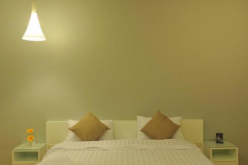 Postel nebo postele na pokoji v ubytování Clear House Phuket
