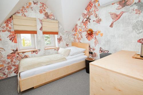 Кровать или кровати в номере Beskid Ski Villa