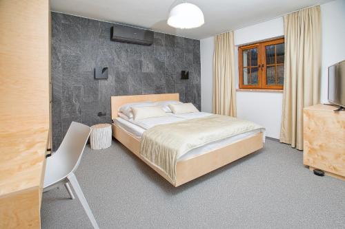 Кровать или кровати в номере Beskid Ski Villa