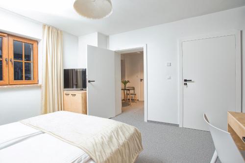 Кровать или кровати в номере Beskid Ski Villa