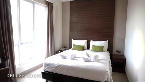 Green Eden Hotelにあるベッド
