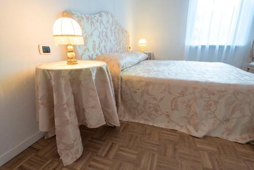 Postel nebo postele na pokoji v ubytování Atrium Verona