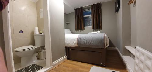 Ванная комната в Belgravia Rooms Hotel