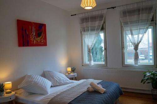 a bedroom with a bed with a stuffed animal on it at Wohnung in Lüneburg in Lüneburg
