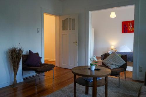 a living room with a couch and a table at Wohnung in Lüneburg in Lüneburg