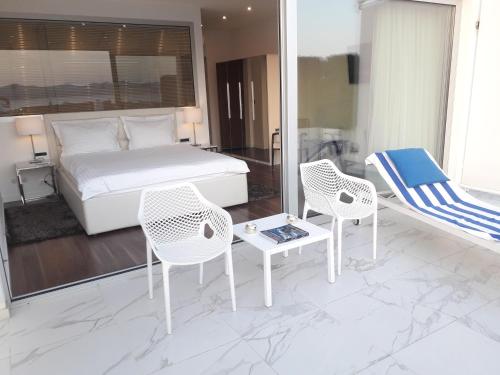 Ένα ή περισσότερα κρεβάτια σε δωμάτιο στο B&B Demar Residence & Dependance