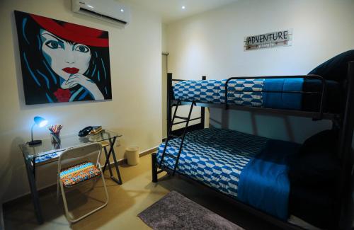 Postel nebo postele na pokoji v ubytování Casa Rosa Smart House