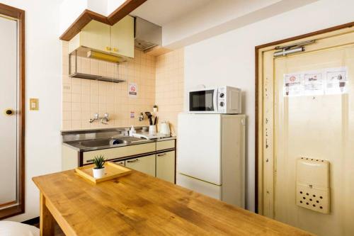 Η κουζίνα ή μικρή κουζίνα στο Maison d'Orme 503
