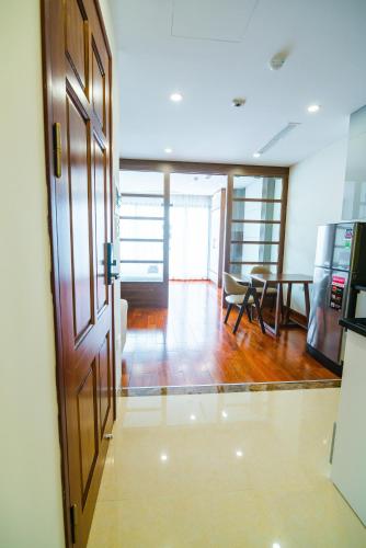 an open door to a room with a table at HANA Stay in Hanoi