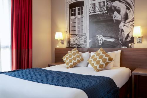 Кровать или кровати в номере Aparthotel Adagio Aix-en-Provence Centre