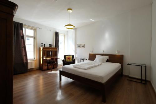 Ένα ή περισσότερα κρεβάτια σε δωμάτιο στο Elisabeth Apartments