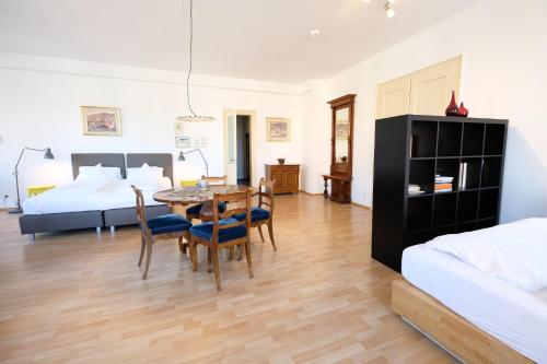 Ένα ή περισσότερα κρεβάτια σε δωμάτιο στο Elisabeth Apartments